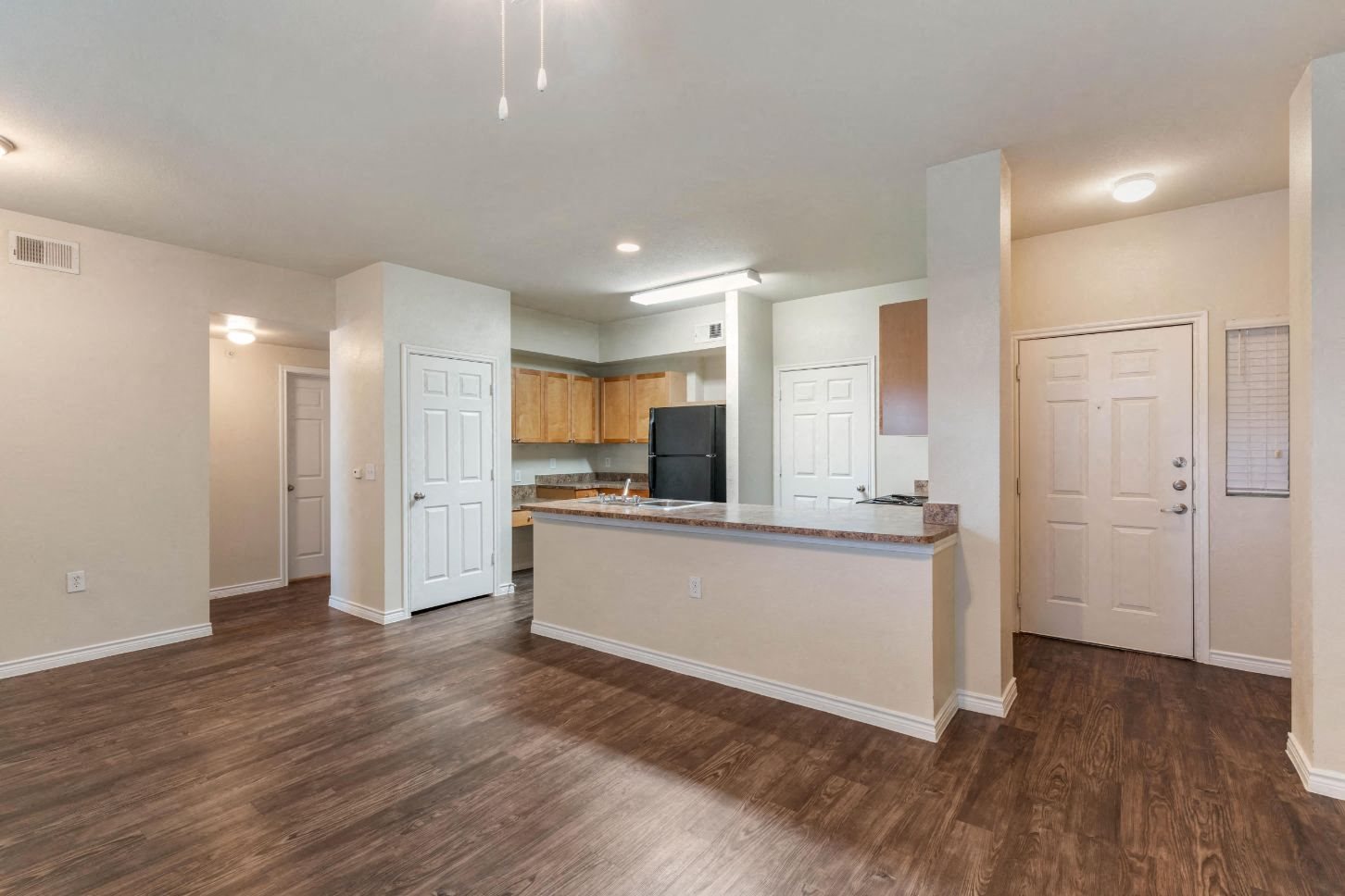 Providence at Marine Creek Apartment Homes | Kitchen with Hardwood Style Flooring